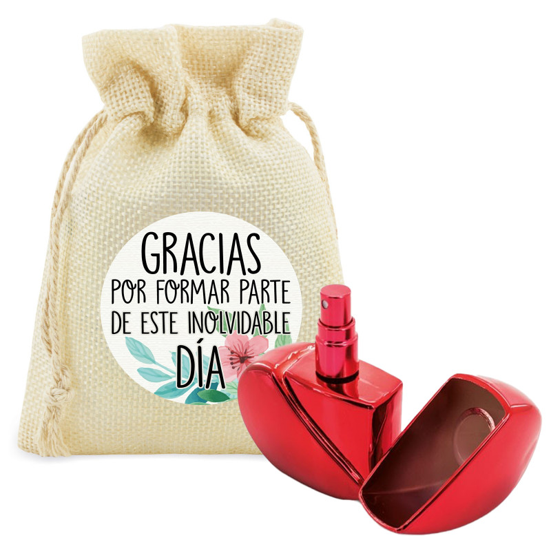 Parfum rechargeable en forme de coeur rouge présenté dans un sachet avec un autocollant phrase de remerciement