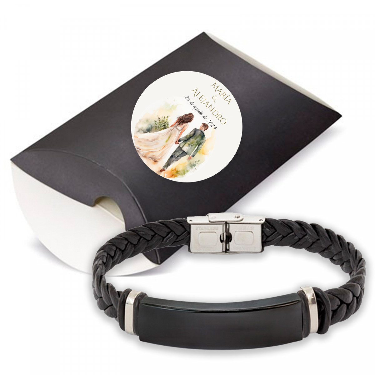 Bracelet en acier noir dans un boîtier en kraft noir avec autocollant personnalisable pour les détails du mariage