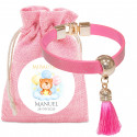 Bracelet rose avec pompon dans pochette en tissu assortie avec adhésif personnalisé pour baptêmes