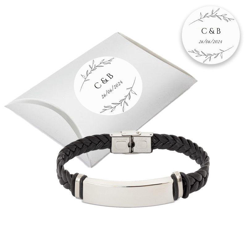 Bracelet en acier pour homme présenté dans une boîte en carton argenté avec autocollant personnalisé pour événements