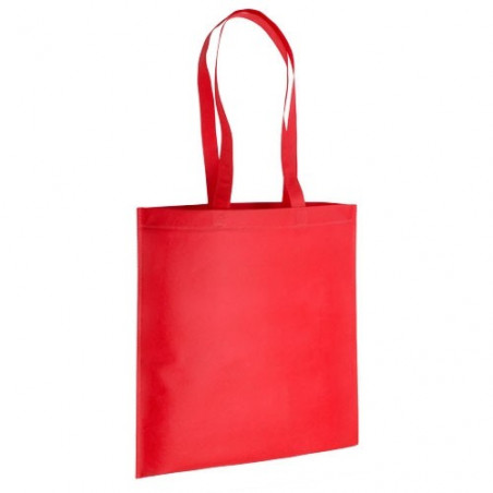 Culotte polaire rouge dans un sac assorti à longue poignée avec étiquette personnalisée et autocollant de Noël